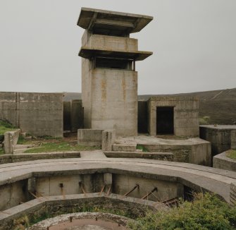 View from NW of Battery observation post showing tower and part of the gun-emplacement.ry observation post, view from north west