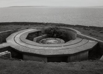 View from W of gun-emplacement showing holdfast and shell loading platform.