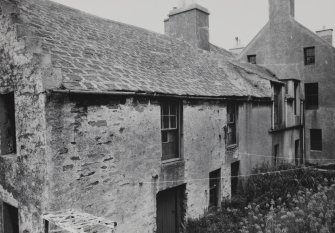 View of 21 and 23 Bridge Street and adjacent buildings, now demolished, from SW.