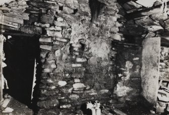 Interior.
Detail of partition wall between kitchen and W apartment, and part of the neuk-bed recess in NW angle.