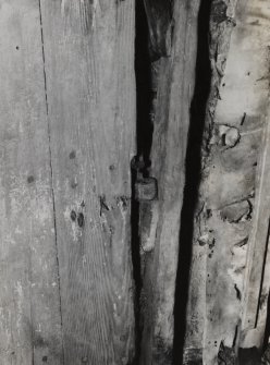 Interior.
Detail of open door showing hinge, between kitchen and W apartment.