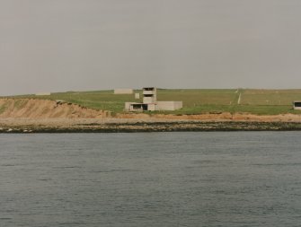 General view (from ferry) from W of Battery Observation Post and searchlight emplacements.