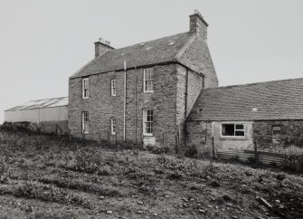 View of farmhouse from W