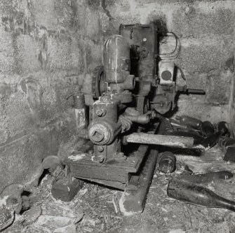 Scar Steading: Detail of pump and engine, used to supply water for steading and house, located on a wall, next to the boiler house