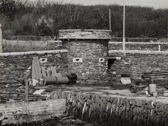 View of defensive turret in Balfour harbour from the East