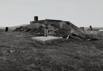 View of S bunker from NE with remains of wooden mast.