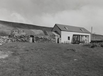 Cottage and thatched byre, view from west