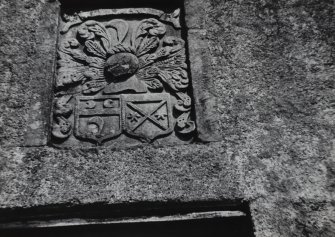 Detail of armorial panel in porch.