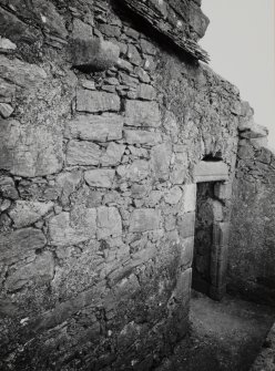 Castle Stalker.
View of South-West parapet walk showing roll-moulded doorway, corbel and roof raggle.