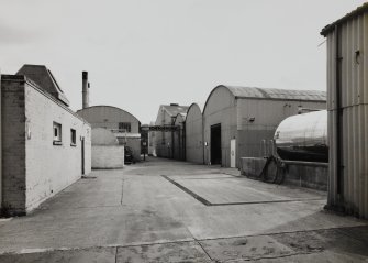 View from SW of northern part of works,including Boiler House, comprising buildings dating from the establishment of the factory by the Ministry of Supply during World War Two (early 1940s)