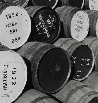 Detailed view of empty casks in yard, many from other distilleries whose whiskies are bottled at Springbank and sold under the 'Cadenhead' label