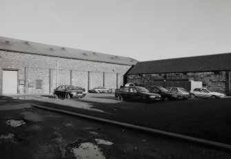 View from W of Duty Free Warehouse No.15 (rack storage) to left, and Bottling Hall(formerly Duty Free Warehouse No.14) to right