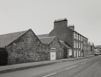 Campbeltown, Millknowe Road, Hazelburn Distillery.
General view of facade from North-West, showing duty free warehouse, dwelling house and former maltings/granaries.