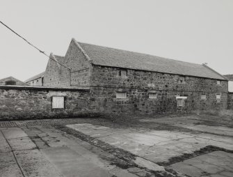 Campbeltown, Millknowe Road, Hazelburn Distillery.
View of distillery yard/duty free warehouses from South.