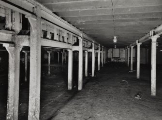 Campbeltown, Millknowe Road, Hazelburn Distillery, interior.
View from South-West of double cast-iron square section columns (single casting) dividing central and North-West maltings blocks at ground floor level (columns 0.15m square).