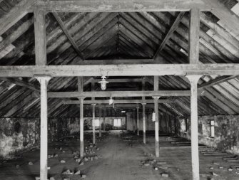 Campbeltown, Millknowe Road, Hazelburn Distillery, interior.
View of Top Floor North-West maltings block from South-West (formerly granary) with queen-post roof trusses on cast-iron columns.