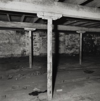 Campbeltown, Millknowe Road, Hazelburn Distillery, interior.
General view of typical small cast iron column in North-West maltings block, Ground Floor (column diameter 0.10m).