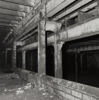 Campbeltown, Millknowe Road, Hazelburn Distillery, interior.
View of double cast iron square section columns (single casting) dividing central and North-West maltings blocks at First Floor level (Columns 0.15m square), also ceramic tiles on low walls.