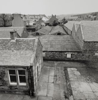 Campbeltown, Millknowe Road, Hazelburn Distillery.
Oblique aerial view of duty free warehouses on North side of distillery from South-East.