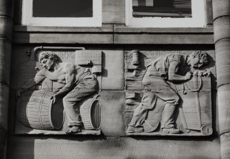 Campbeltown, Hall Street, Campbeltown Library and Museum.
Detail of frieze on East elevation showing a distiller and a miner.