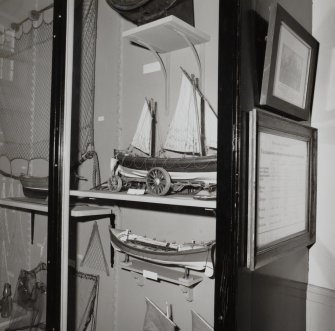 Campbeltown, Hall Street, Campbeltown Library and Museum, interior.
View of boat-holding display case in Museum.