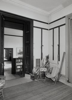 View of entrance hall looking towards the library from West