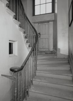 View of 19th century service stair at basement level.