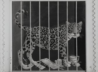 Inner Hall, detail of painted fireboard of a caged leopard by C E Brett.