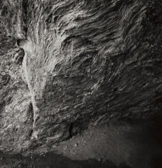 St Columba's Cave.
Detail of cave wall near mouth showing various carved features.