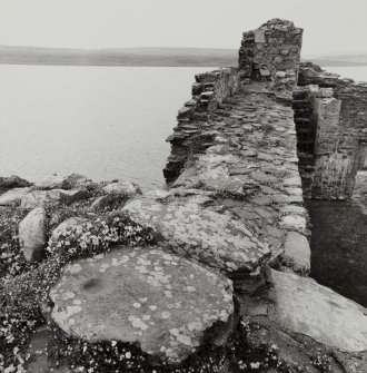 Castle Sween.
View of South wall-head from South-East angle, showing socketed stone.