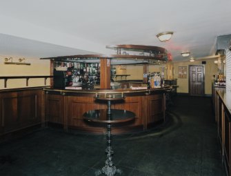 Interior.  Stalls bar, view from E