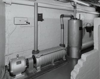 Interior.  Understage area, view of vacuum-cleaning system motor