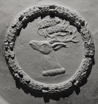 Dunderave Castle, interior.
Detail of heraldic emblem on ceiling in fourth floor chamber of South wing.