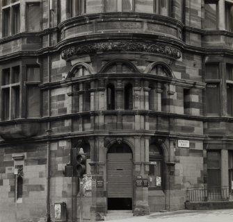 View of corner entrance from NE, at junction with Hope Street.