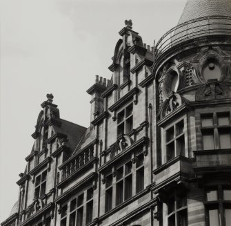 Detail of top floor windows.