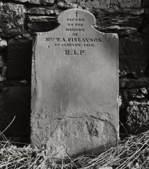 View of tombstone of Mrs T A Finlayson, SE wall of churchyard.