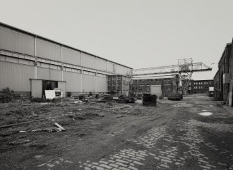 Glasgow, 739 South Street, North British Engine Works.
General view from South showing open store area (stockyard) next to main workshop (note overhead travelling crane).