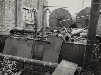 Glasgow, 739 South Street, North British Engine Works.
Detail of former water tank, used with engine test bed (located next to boiler house) behind can be seen circular oil tanks, which were previously Lancashire boilers.