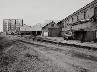 Glasgow, Springburn, St Rollox Locomotive Works.
General view from East of exterior of (left and right) boiler house, crane shop and erecting shop.