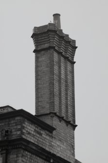 Glasgow, 191-197 Scotland Street, Howden's Works.
Detail of chimney stack on gatehouse at East end of Scotland Street frontage.