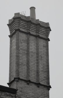 Glasgow, 191-197 Scotland Street, Howden's Works.
Detail of chimney stack on gatehouse at East end of Scotland Street frontage.