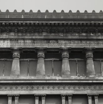 View of third floor columns on W facade.