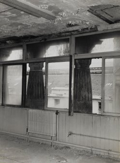 Interior.
View of upper floor windows with colonnade outside
