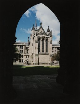 View of chapel through cloisters to East South East.