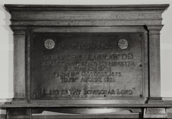 Glasgow, 485 St. George's Road, St. George's In The Fields, interior.
General view of brass plaque in North Lobby with Classical surround.
Insc: 'Remembrance. Rev. Andrew Laidlaw. D.D. Devoted And Beloved Minister To This Church From 19th October 1875 To 25th August 1921. "Blest Be Thy Love, Dear Lord" ' .
