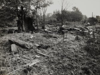 View from W of ruinous remains on SE side of Store/ Magazine (B20309), photographed 28 October 1993