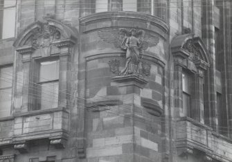 Glasgow, 28 West Campbell Street, McGeoch's Building.
Detail of carved angel on North-West angle of buildingat corner with Cadogen Street.