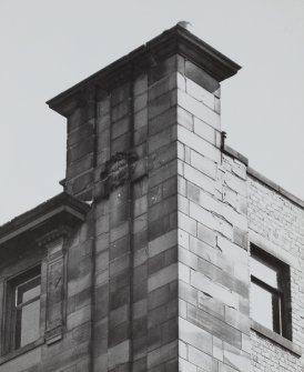 Glasgow, 28 West Campbell Street, McGeoch's Building.
Detail of carved panels at wall-head level on chimney stack.