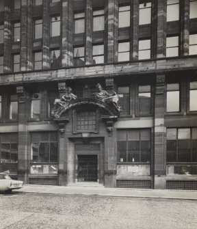Glasgow, 28 West Campbell Street, McGeoch's Building.
General view of entrance with carved figures above pediment from West.