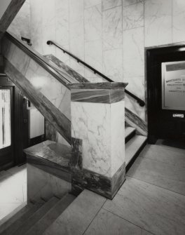 Interior.
View of main staircase at mezzanine landing between ground and first floors from SW.